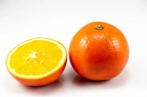 One and half oranges Stock Photos