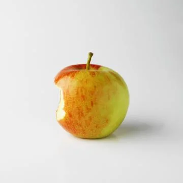 One apple on white background with bite mark Stock Photos
