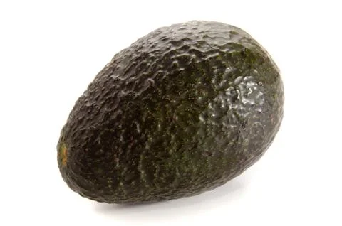 One avocado on bright background Stock Photos
