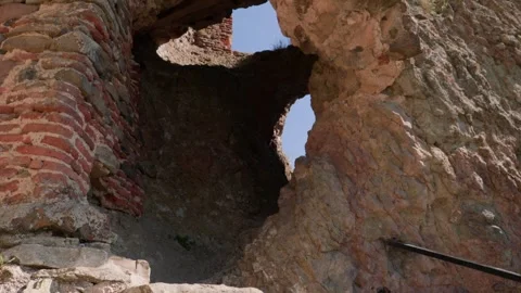 One bald guy is hiking in the mountains on a sunny bright day Video stock 248868189