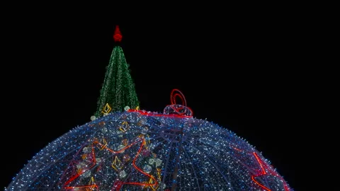 One ball with garlands by pine tree outdoor. Stock Footage 330666012