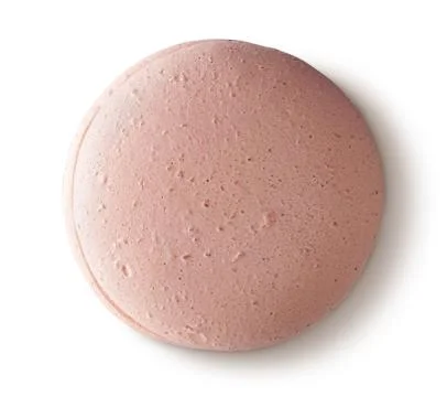 One beige macaroon top view Stock Photos