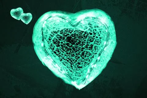 One big and two small green glowing hearts. Symbol for healthcare professionals Stock Photos