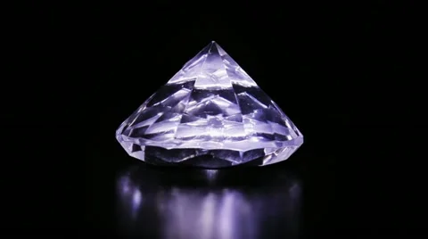 One big diamond stone rotating over dark background Video stock 10914158