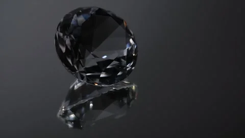 One big round crystal, clear Diamond rotating over black background Stock Footage 315612947