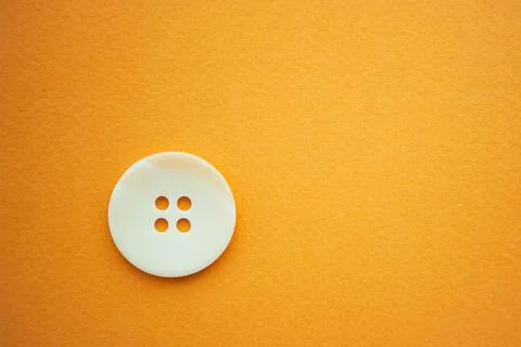 One big white button on yellow background, copy space Foto stock