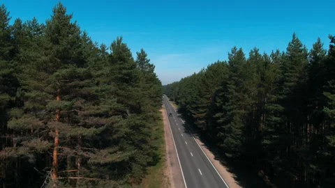 One black car driving alone, travel on empty straight asphalt road freeway Video stock 252293867