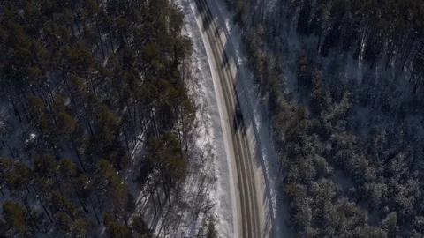 One black SUV driving on freeway in hilly lanscapes - Aerial view Vidéo 104853707