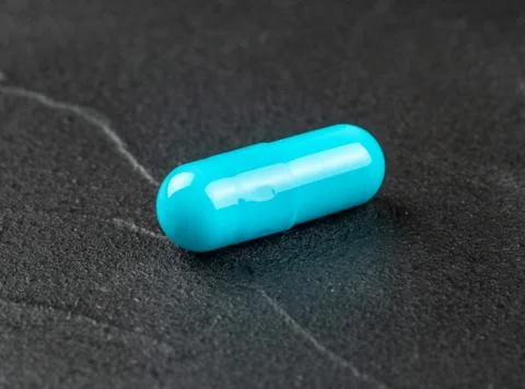 One blue capsule Stock Photos