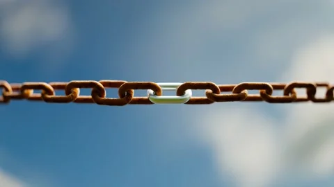 One brand new shiny link in a rusty old steel chain. Modern tough material. 4KHD Stock Footage 201229701