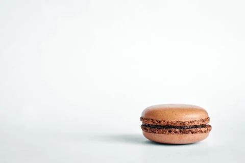 One brown macaron stack on gray background 写真素材