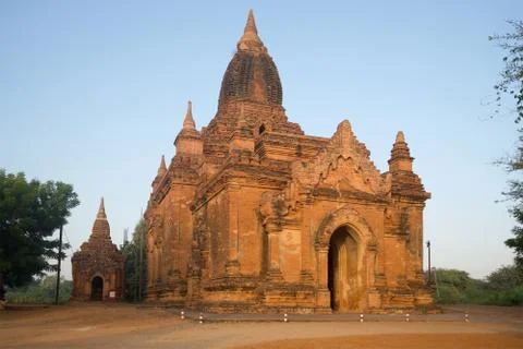 One of the Buddhist temples of old Bagan in the early morning. Myanmar Stock Photos