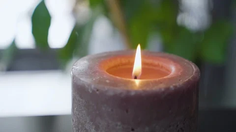 One Burning Candle Close-up. Burning of a Single Candle. Video stock 97697772