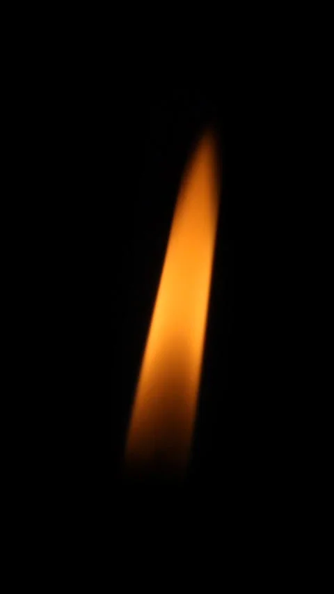 One burning candle flame on black background. Stock Footage 303836447