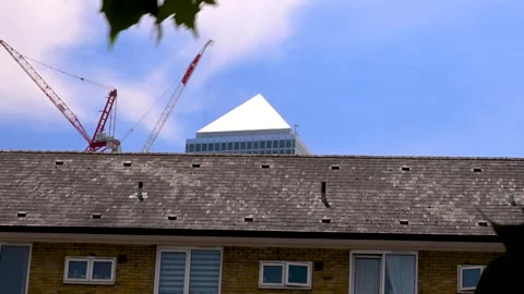 One Canada Square Pyramid Above Residential Rooftop Construction Cranes Stock Footage 339652686