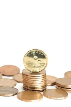 One canadian dollar coins stack on white background Stock Photos