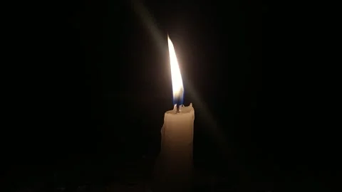 One candle burns with a bright burning flame. Symbol of faith, religion, Ch.. Stock Footage 327952312