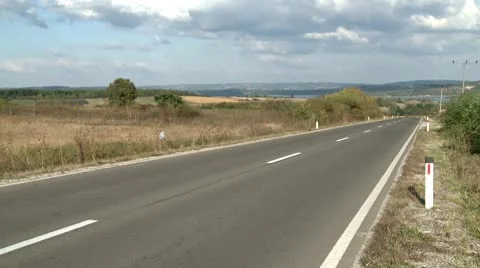 One car at empty road Stock Footage 8853678