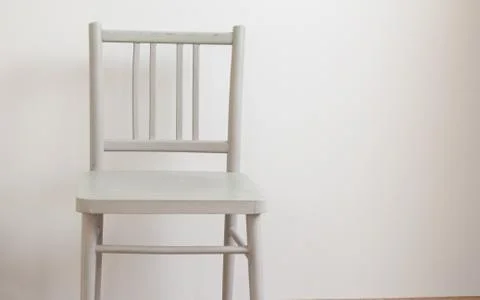 One chair in empty room Stock Photos