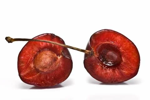 One cherry cut. Stock Photos