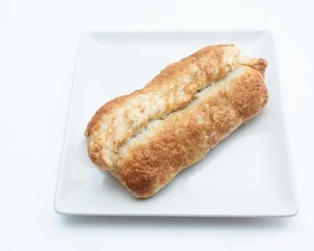 One crisp apple pie is highlighted on a white background. Foto stock