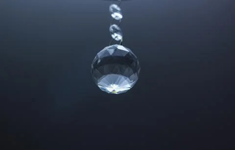 One crystal from a lamp on the ceiling Stock Photos