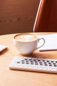 One cup of coffee on a working table. Foto stock