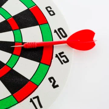 One darts in target Stock Photos
