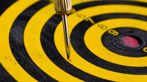 One darts in target Stock Photos