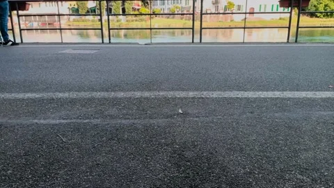 One day of post lock dowun people walk along a river Stock Footage 131972940