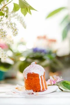 One decorated Easter cake on a napkin with apple blossom and branch of cher.. Stock Photos
