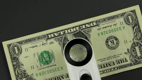 One dollar bill rotates. An enlarged portrait of D. Washington on a one-dolla Stock Footage 130195979