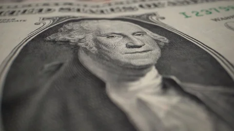 One dollar bill rotates on a table Video stock 121644699
