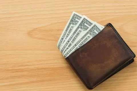 One dollar bill in wallet Foto stock
