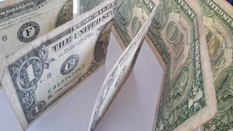 One dollar bills lined up on a white background. Financial concept and money Stock Photos
