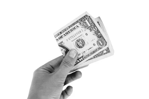 One dollar in the hand Stock Photos