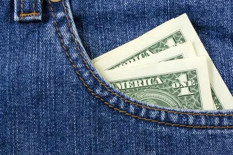 One dollar in pocket Stock Photos