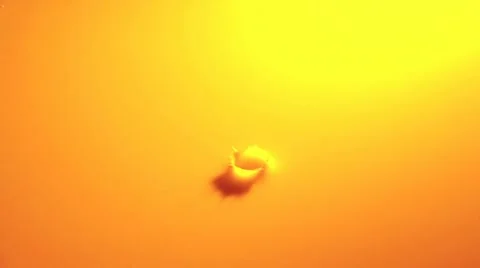 One Drop of Liquid Falling Into Orange Background 3 스톡 동영상 19095272