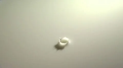 One Drop of Liquid Falling Into White Background Stock-Footage 19094995