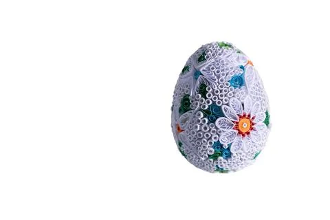 One Easter egg isolated from a white background with a floral pattern. Stock Photos
