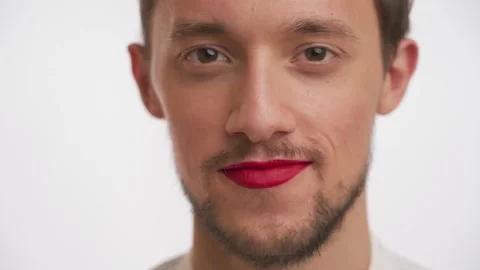 One effeminate man use makeup shakes his head, denies, stare at camera closeup Stock Footage 147612854