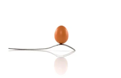 One egg and one forks Stock Photos