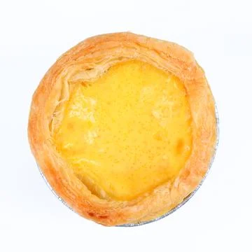 One egg tart on foiled container isolated on white Stock Photos