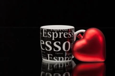 One empty coffee cup and red heart 스톡 사진