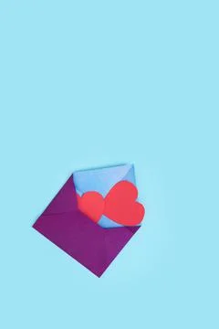 From one envelope go out two red heart. love Valentine day on 14th February Stock Photos