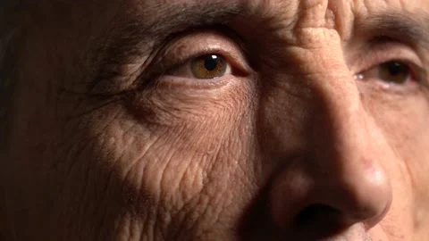 One Eye of the Elderly Man Looks to the Side. Stock Footage 165992850