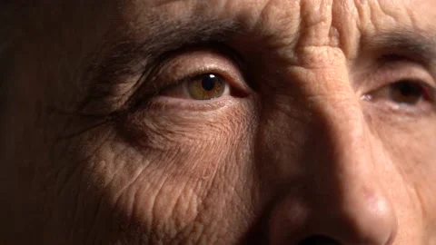 One Eye of the Elderly Man Looks to the Side. Stock Footage 166103965