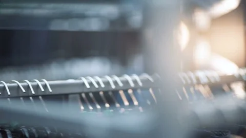 One female choosing jackets inside of mens hypermarket closeup Video stock 79249463