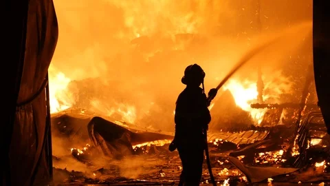 One Firefighter In Front Of A Burning Building Stock Footage 91332881