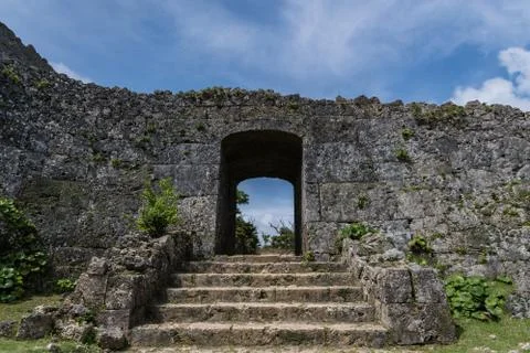 One gate in the stone wall Stock Photos